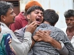 Relatives of 15-year-old Akash Patni, who was one of the people killed on the ground in the AI-171 crash, mourn outside Civil Hospital in Ahmedabad. (Raju Shinde/HT) Relatives of 15-year-old Akash Patni, who was one of the people killed on the ground in the AI-171 crash, mourn outside Civil Hospital in Ahmedabad. (Raju Shinde/HT)