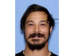 Travis Decker is the focus of a massive manhunt following the murders of his three daughters in Washington. (Wenatchee Police Department via AP)