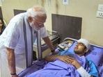 Prime Minister Narendra Modi meets an injured of the Air India plane crash, at a hospital in Ahmedabad on Friday, Prime Minister Narendra Modi meets an injured of the Air India plane crash, at a hospital in Ahmedabad on Friday,