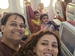 While on the plane, Pratik Joshi took a selfie of the family in which all five of them are seen smiling. 