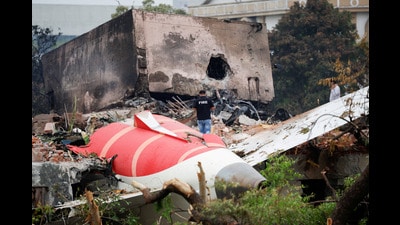 A fire officer stands next to the crashed Air India Boeing 787-8 Dreamliner aircraft, in Ahmedabad (REUTERS) A fire officer stands next to the crashed Air India Boeing 787-8 Dreamliner aircraft, in Ahmedabad (REUTERS)