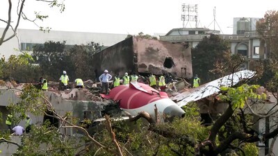 The wreckage of the ill-fated London-bound Air India flight on the rooftop of the doctors' hostel in Ahmedabad on Thursday. Efforts are underway to move the wreckage. (PTI)