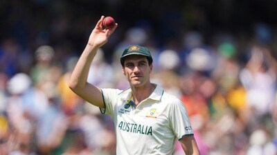 Australia's captain Pat Cummins holds up the ball to celebrate his six-wicket haul on day two. (AP) Australia's captain Pat Cummins holds up the ball to celebrate his six-wicket haul on day two. (AP)