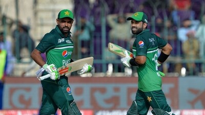 Pakistan's Babar Azam (L) and Mohammad Rizwan run between the wickets (AFP) Pakistan's Babar Azam (L) and Mohammad Rizwan run between the wickets (AFP)
