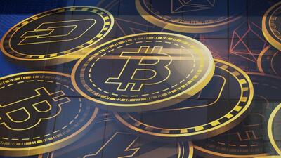 FILE - An advertisement for the cryptocurrency, Bitcoin, is displayed on a building. (AP) FILE - An advertisement for the cryptocurrency, Bitcoin, is displayed on a building. (AP)