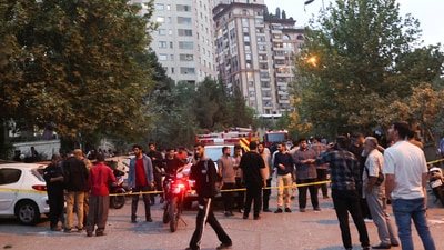 People gather in the street in the aftermath of Israeli strikes, in Tehran, Iran, June 13, 2025. Majid Asgaripour (Reuters)