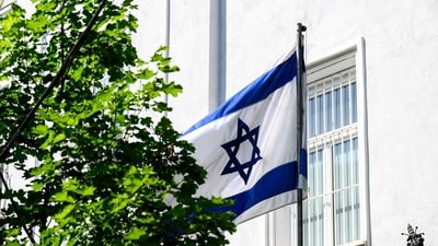 The Israeli flag flutters in front of the Israeli embassy in Vienna on June 13, 2025. (AFP) The Israeli flag flutters in front of the Israeli embassy in Vienna on June 13, 2025. (AFP)