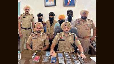 The four accused in the custody of Mohali police. (HT Photo) The four accused in the custody of Mohali police. (HT Photo)