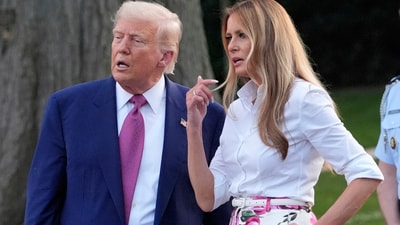 President Donald Trump and first lady Melania Trump talk during the congressional picnic on the South Lawn of the White House, Thursday, June 12, 2025, in Washington. (AP Photo/Alex Brandon) (AP) President Donald Trump and first lady Melania Trump talk during the congressional picnic on the South Lawn of the White House, Thursday, June 12, 2025, in Washington. (AP Photo/Alex Brandon) (AP)