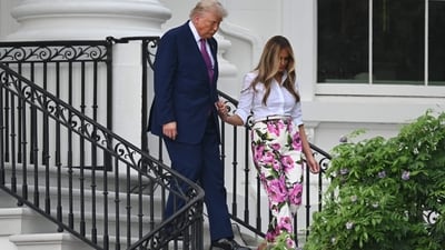 US President Donald Trump (L) and US First Lady Melania Trump arrive to attend the Congressional Picnic on the South Lawn of the White House in Washington, DC, on June 12, 2025. (Photo by SAUL LOEB / AFP) (AFP) US President Donald Trump (L) and US First Lady Melania Trump arrive to attend the Congressional Picnic on the South Lawn of the White House in Washington, DC, on June 12, 2025. (Photo by SAUL LOEB / AFP) (AFP)