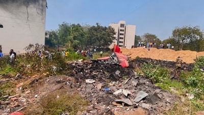 Ahmedabad: People look at the debris of the Air India plane that crashed moments after taking off from the airport, in Ahmedabad, Thursday, June 12. (PTI) Ahmedabad: People look at the debris of the Air India plane that crashed moments after taking off from the airport, in Ahmedabad, Thursday, June 12. (PTI)