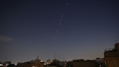Army air defence firing is seen following the Israeli strike in Tehran, Iran, June 13. (via REUTERS)