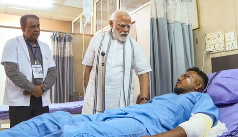 In this video grab via PMO, Prime Minister Narendra Modi meets Vishwash Kumar Ramesh, the lone survivor of Air India plane crash. (PMO)