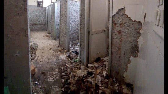 The work continues at the male toilet in the emergency and trauma wards in the civil hospital in Ludhiana. (HT Photo)