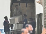 Coffins were brought to the mortuary where the victims of the Air India plane crash are being identified through DNA testing Coffins were brought to the mortuary where the victims of the Air India plane crash are being identified through DNA testing