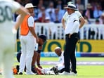 South Africa's Temba Bavuma gets medical attention after sustaining an injury.