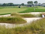 Jacuqes Kruyswijk plays a shot from a bunker on the 15th hole during the second round of the US Open golf tournament.