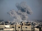 A plume of smoke rises during an Israeli strike on Jabalia in the northern Gaza Strip on June 13, 2025.