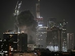 Smoke billows after a projectile hit a building in Tel Aviv after Iran launched multiple waves of missile attacks on Saturday. Smoke billows after a projectile hit a building in Tel Aviv after Iran launched multiple waves of missile attacks on Saturday.