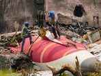 Wreckage of the crashed Air India plane being lifted through a crane, in Ahmedabad, Gujarat, Saturday, June 14 Wreckage of the crashed Air India plane being lifted through a crane, in Ahmedabad, Gujarat, Saturday, June 14