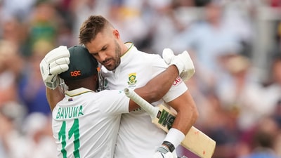 Aiden Markram is congratulated by his captain Temba Bavuma after bringing up his century at Lord's in the WTC Final. (AP) Aiden Markram is congratulated by his captain Temba Bavuma after bringing up his century at Lord's in the WTC Final. (AP)