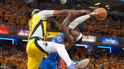 Oklahoma City Thunder guard Luguentz Dort, right, tries to shoot over Indiana Pacers center Myles Turner during the second half of Game 4 of the NBA Finals basketball series, Friday, June 13, 2025, in Indianapolis. (AP Photo/Michael Conroy) (AP) Oklahoma City Thunder guard Luguentz Dort, right, tries to shoot over Indiana Pacers center Myles Turner during the second half of Game 4 of the NBA Finals basketball series, Friday, June 13, 2025, in Indianapolis. (AP Photo/Michael Conroy) (AP)