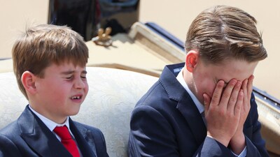 Prince George reacts as he rides a carriage with Prince Louis, Catherine, Princess of Wales, and Princess Charlotte (not pictured) as part of the Trooping the Colour parade which honours Britain's King Charles on his official birthday, in London, Britain, June 14, 2025. REUTERS/Isabel Infantes (REUTERS)