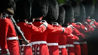 Scots Guards, a regiment of the Household Division Foot Guards, take part in the King's Birthday Parade "Trooping the Colour" in London on June 14, 2025. The ceremony of Trooping the Colour is believed to have first been performed during the reign of King Charles II. Since 1748, the Trooping of the Colour has marked the official birthday of the British Sovereign. Over 1500 parading soldiers and almost 300 horses take part in the event. (Photo by Ben STANSALL / AFP) (AFP)
