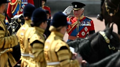 Britain's King Charles III salutes members of the royal guard during the King's Birthday Parade "Trooping the Colour" in London on June 14, 2025. The ceremony of Trooping the Colour is believed to have first been performed during the reign of King Charles II. Since 1748, the Trooping of the Colour has marked the official birthday of the British Sovereign. Over 1500 parading soldiers and almost 300 horses take part in the event. (Photo by Ben STANSALL / AFP) (AFP) Britain's King Charles III salutes members of the royal guard during the King's Birthday Parade "Trooping the Colour" in London on June 14, 2025. The ceremony of Trooping the Colour is believed to have first been performed during the reign of King Charles II. Since 1748, the Trooping of the Colour has marked the official birthday of the British Sovereign. Over 1500 parading soldiers and almost 300 horses take part in the event. (Photo by Ben STANSALL / AFP) (AFP)