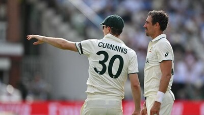 Australia's captain Pat Cummins (L) and Australia's Mitchell Starc (R) talk on day three. (AFP) Australia's captain Pat Cummins (L) and Australia's Mitchell Starc (R) talk on day three. (AFP)