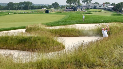 Jacuqes Kruyswijk plays a shot from a bunker on the 15th hole during the second round of the US Open golf tournament. (Bill Streicher-Imagn Images)
