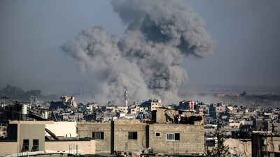 A plume of smoke rises during an Israeli strike on Jabalia in the northern Gaza Strip on June 13, 2025. (AFP)