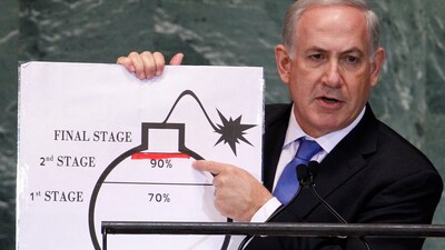 Israel's Prime Minister Benjamin Netanyahu points to a red line he drew on the graphic of a bomb used to represent Iran's nuclear programme as he addresses the 67th United Nations General Assembly at the UN Headquarters in New York, September 27, 2012. (REUTERS)