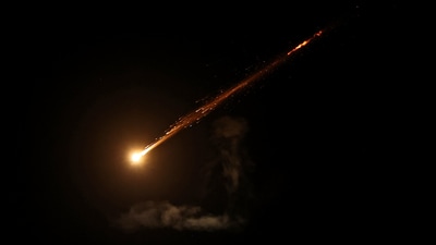 This picture shows a trail from an Iranian rocket in the sky above Jerusalem on June 13. (AFP) This picture shows a trail from an Iranian rocket in the sky above Jerusalem on June 13. (AFP)