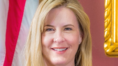 Melissa Hortman had recently voted in favour of cutting healthcare for undocumented immigrants (via REUTERS)