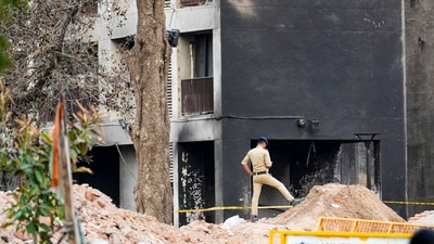 The massive airliner of the Tata group-owned Air India caused massive damage to the hostel complex of the BJ medical college. Authorities and rescuers were seen clearing out the plane debris and looking for any possible bodies at the site. (PTI) The massive airliner of the Tata group-owned Air India caused massive damage to the hostel complex of the BJ medical college. Authorities and rescuers were seen clearing out the plane debris and looking for any possible bodies at the site. (PTI)