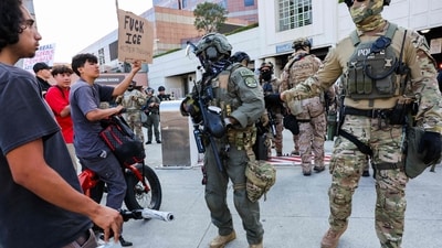 Protesters confront law enforcement outside of a federal building and Immigration and Customs Enforcement (ICE) detention center on June 13, 2025, in Los Angeles, California. Demonstrations continue after a series of immigration raids began last Friday, June 6th. (Getty Images via AFP) Protesters confront law enforcement outside of a federal building and Immigration and Customs Enforcement (ICE) detention center on June 13, 2025, in Los Angeles, California. Demonstrations continue after a series of immigration raids began last Friday, June 6th. (Getty Images via AFP)