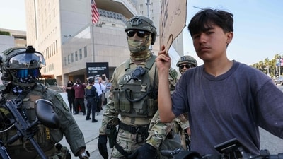 Protesters confront law enforcement outside of a federal building and Immigration and Customs Enforcement (ICE) detention center on June 13, 2025, in Los Angeles, California. (Getty Images via AFP) Protesters confront law enforcement outside of a federal building and Immigration and Customs Enforcement (ICE) detention center on June 13, 2025, in Los Angeles, California. (Getty Images via AFP)