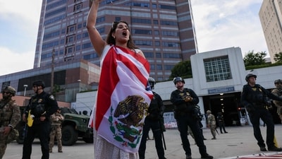 Protesters raised anti-Trump slogans outside of a federal building and Immigration and Customs Enforcement (ICE) detention center on June 13, 2025, in Los Angeles, California. (Getty Images via AFP) Protesters raised anti-Trump slogans outside of a federal building and Immigration and Customs Enforcement (ICE) detention center on June 13, 2025, in Los Angeles, California. (Getty Images via AFP)