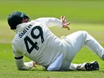 Australia's Steve Smith reacts after sustaining an injury.