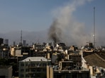 Smoke rises from an explosion following the Israeli strikes on Iran