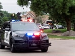 Law enforcement establish a security perimeter near the residence of senior Democratic state assemblywoman Melissa Hortman after Hortman and her husband, Mark, were shot and killed earlier in the day, in Brooklyn Park, Minnesota, U.S., June 14, 2025. 