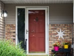 Bullet holes mark the front door of Minnesota state  Senator John Hoffman, who was shot alongside his wife, Yvette, in what is believed to be an attack by 57-year-old suspect Vance Luther Boelter, who is also the lead suspect in the shooting deaths of senior Democratic state assemblywoman Melissa Hortman and her husband, Marc, in Champlin, Minnesota, U.S., June 14, 2025. (REUTERS/Tim Evans)
