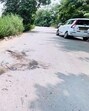 The spot on the service road in Ghaziabad's Tila Mod where the body was found wrapped in a bag. (Sakib Ali/HT Photo)