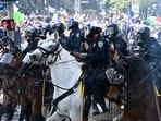 California Highway Patrol and Los Angeles Metro Police advance on horseback on June 14, 2025 in Los Angeles, California as they disperse protesters after the "No Kings" demonstration. (Photo by Robyn Beck / AFP) California Highway Patrol and Los Angeles Metro Police advance on horseback on June 14, 2025 in Los Angeles, California as they disperse protesters after the "No Kings" demonstration. (Photo by Robyn Beck / AFP)