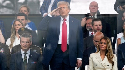 Melania Trump went viral for appearing to nod off while attendees left early during Trump's birthday parade.
(AP/PTI)(AP06_15_2025_000056A) (AP) Melania Trump went viral for appearing to nod off while attendees left early during Trump's birthday parade.
(AP/PTI)(AP06_15_2025_000056A) (AP)