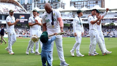 South Africa's Temba Bavuma with his son holding the ICC Test Championship Mace. (Action Images via Reuters)