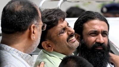 A family member mourns the death of an Air India flight crash victim as he arrives to collect mortal remains outside a hospital mortuary in Ahmedabad on June 15, 2025. (AFP) A family member mourns the death of an Air India flight crash victim as he arrives to collect mortal remains outside a hospital mortuary in Ahmedabad on June 15, 2025. (AFP)