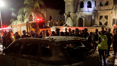 Rescue and security personnel operate after missiles fired from Iran impacted a residential building in northern Israel, in Tamra, Israel, June 15, 2025. (Itay Cohen/REUTERS)