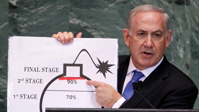 Israel's Prime Minister Benjamin Netanyahu points to a red line he drew on the graphic of a bomb used to represent Iran's nuclear programme as he addresses the 67th United Nations General Assembly at the UN Headquarters in New York, September 27, 2012. (REUTERS)